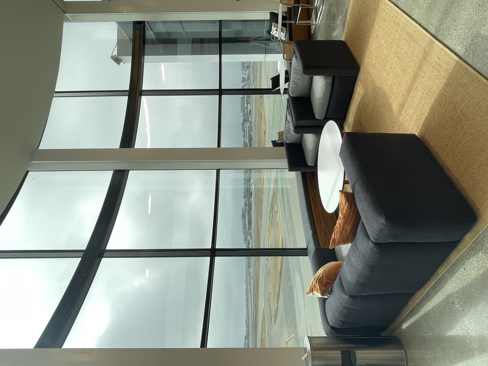 Seating area with a panoramic view of the Long Beach Airport runways