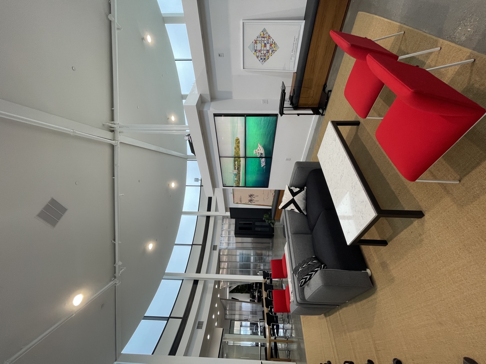 Circle Real Estate lounge with video wall where pipeline reviews happen